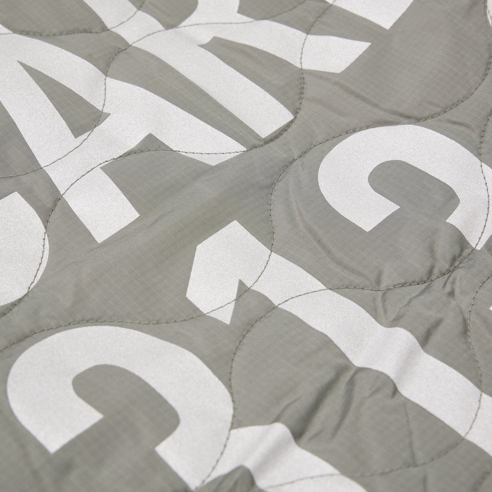Carhartt WIP Tour Quilted Blanket Smoke / Reflective sold by Livestock product image thumbnail 3