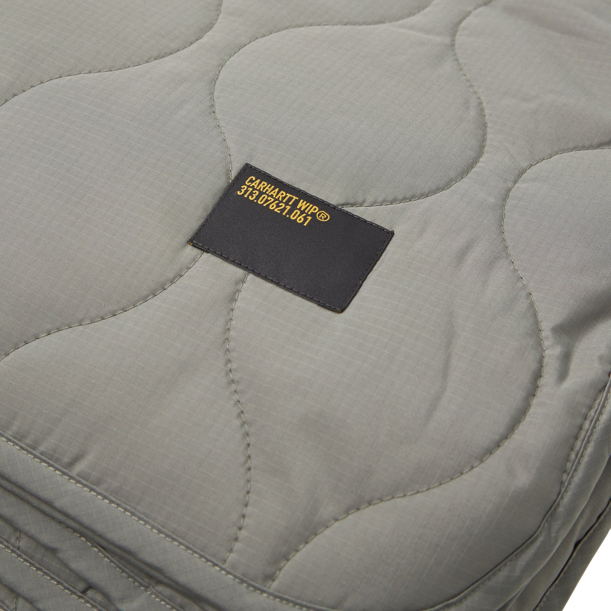 Carhartt WIP Tour Quilted Blanket Smoke / Reflective sold by Livestock product image thumbnail 4
