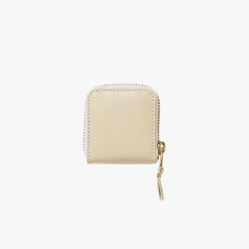 COMME des GARÇONS WALLET Classic Leather Zip Wallet / Off White sold by Livestock