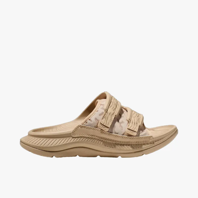 Hoka One One Ora Luxe Shifting Sand / Dune sold by Livestock