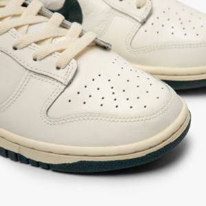 Nike Dunk Low Sail / Deep Jungle - Coconut Milk sold by Livestock