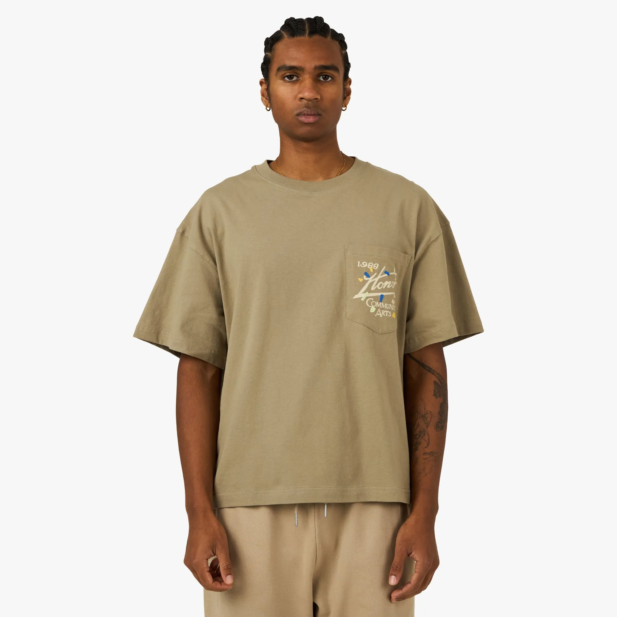 Honor The Gift Community Arts T-Shirt Pebble sold by Livestock