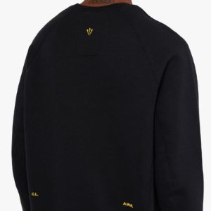 Nike NOCTA Tech Fleece Crewneck Black / University Gold sold by Livestock