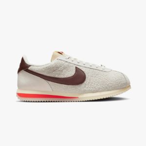 Nike Women's Cortez '23 Sail / Earth - Lt Orewood Brown sold by Livestock