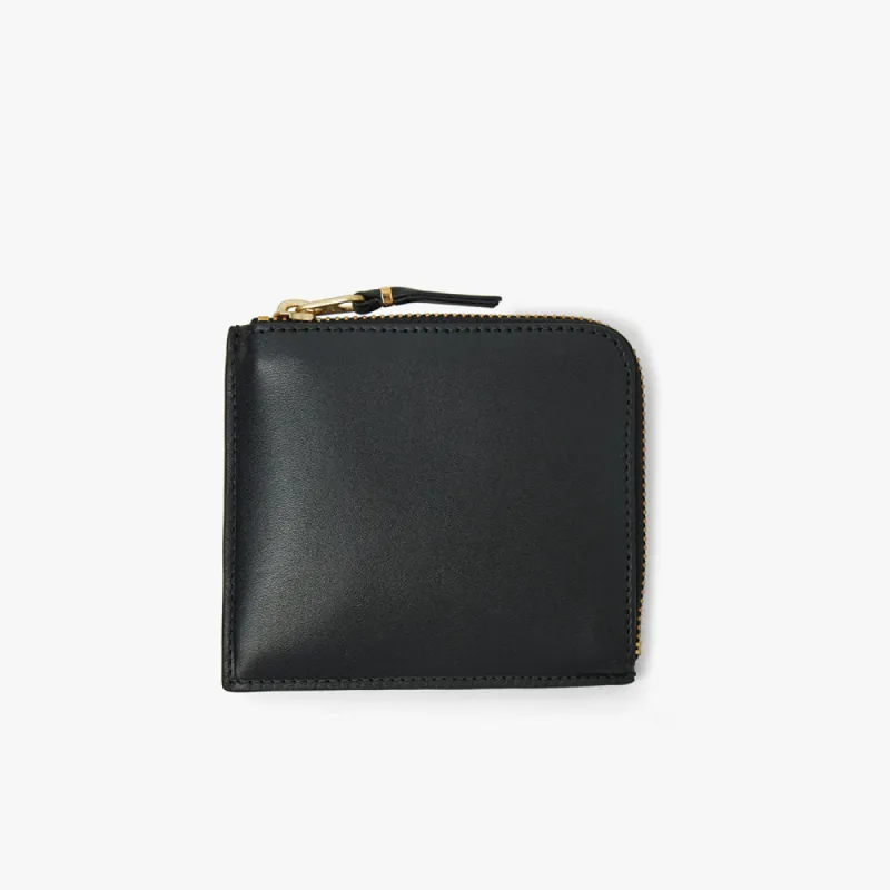 COMME des GARÇONS WALLET Classic Half Zip Wallet / Polka Dot Print sold by Livestock