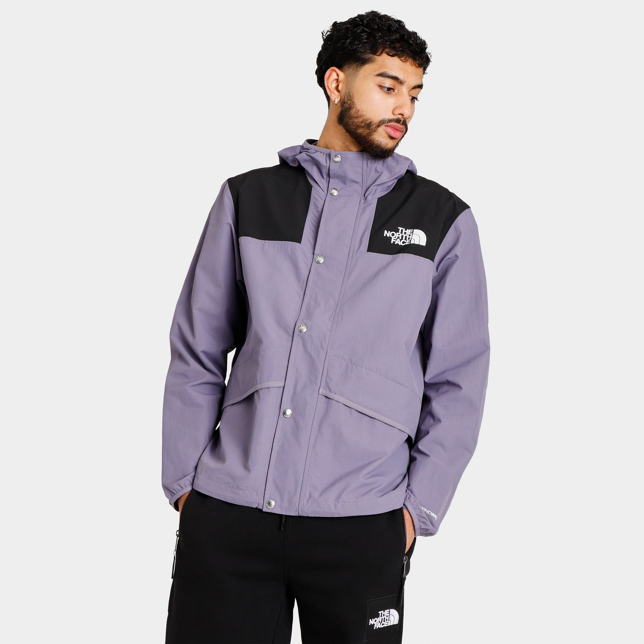 The North Face 86 Mountain Wind Jacket Lunar Slate / Black sold by JD Sports
