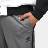adidas Originals SST Track Pants Grey Four / Black sold by JD Sports