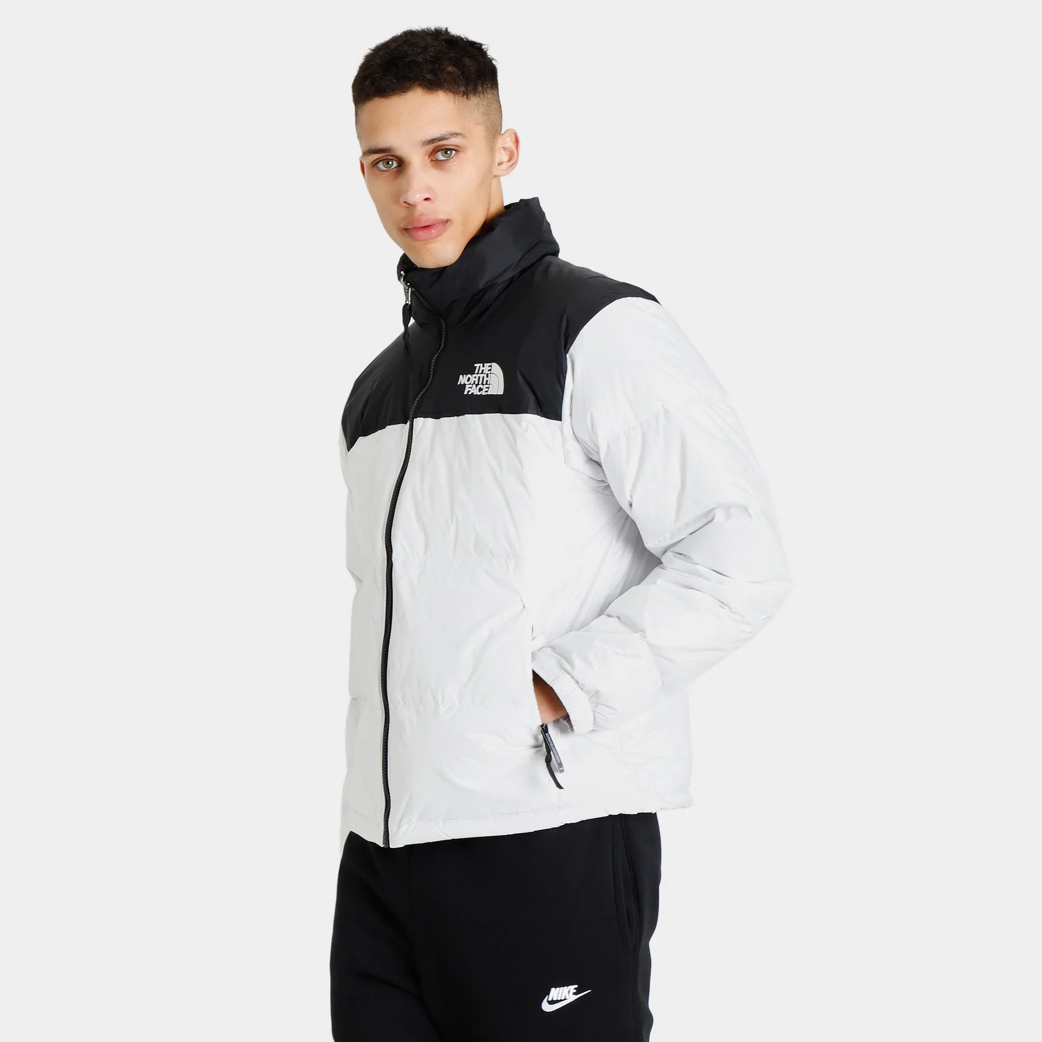 The North Face 1996 Retro Nuptse Jacket TNF White / TNF Black sold by JD Sports