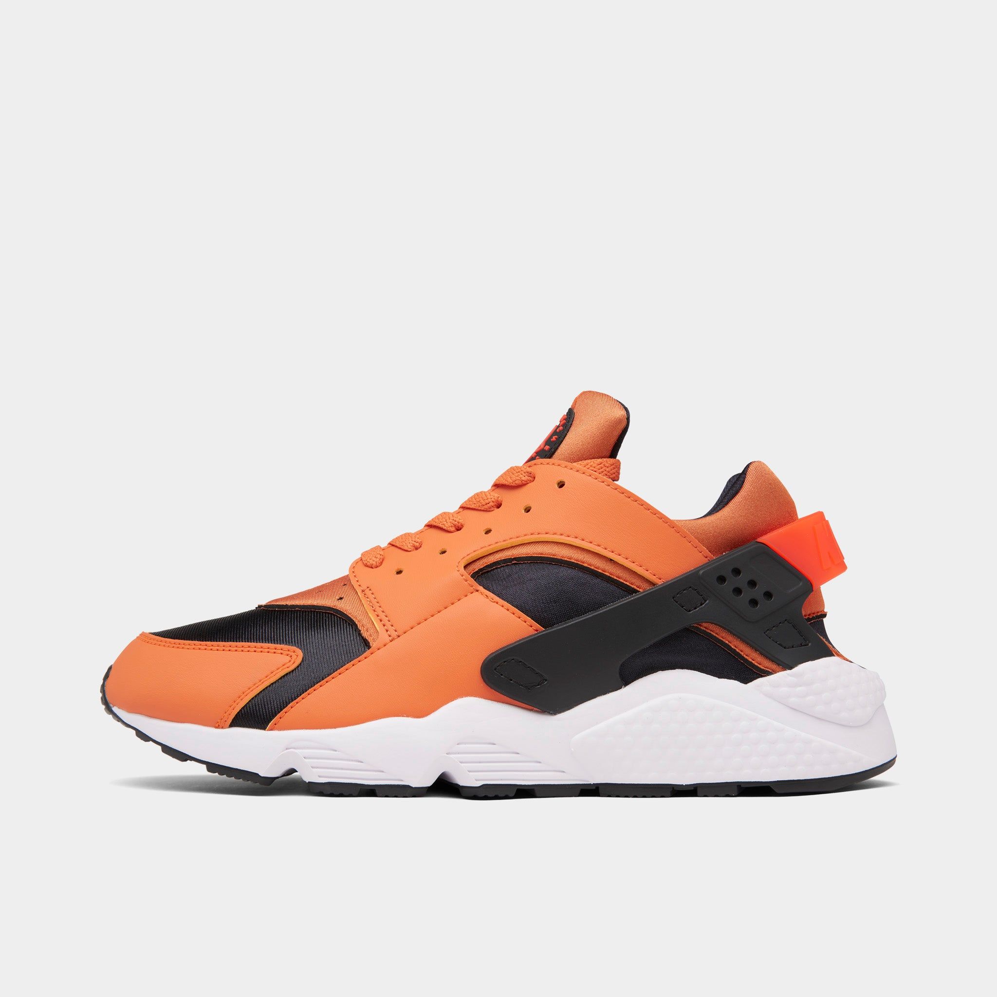 Nike Air Huarache Hot Curry / Orange - Black sold by JD Sports