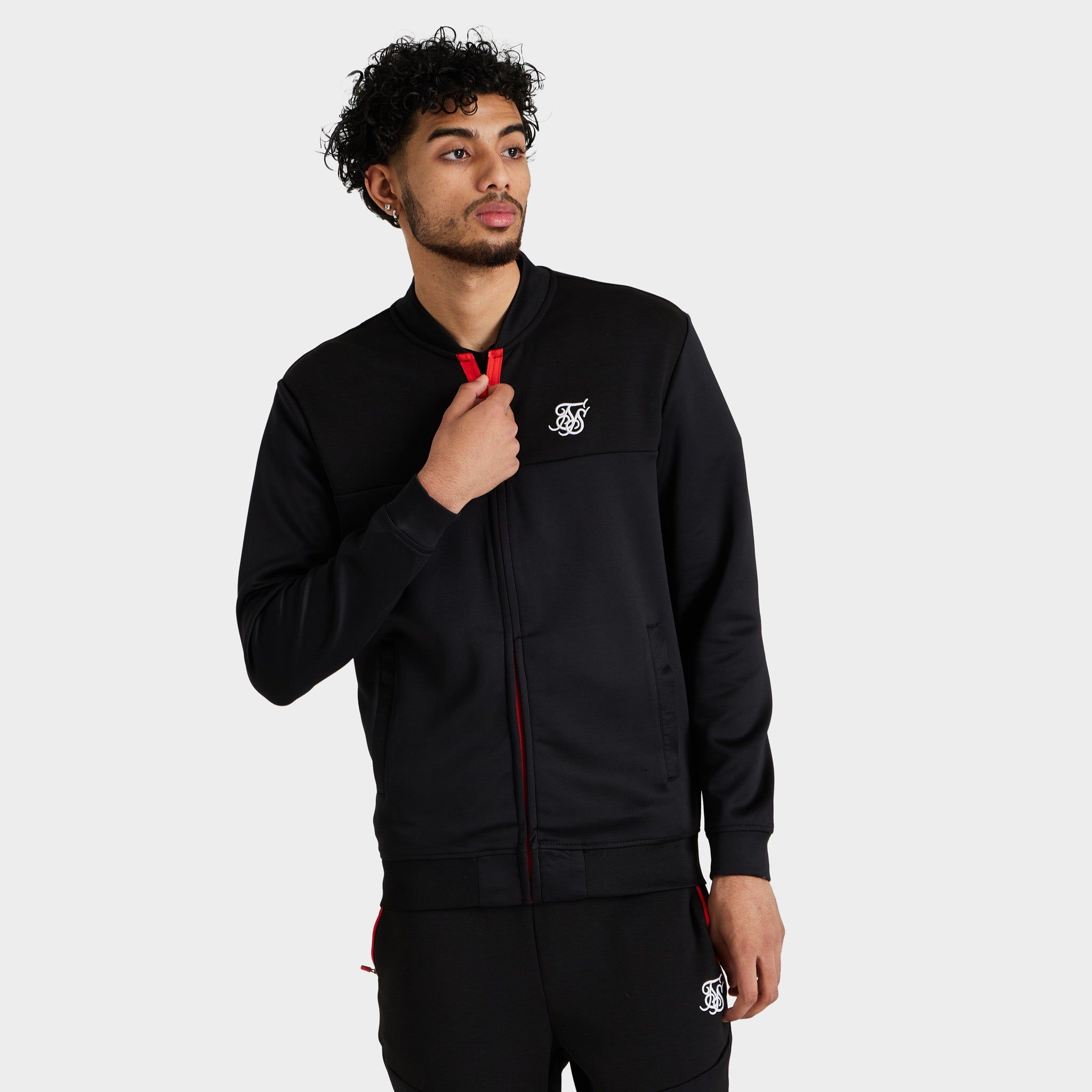 SikSilk Covert Track Bomber Black / Red sold by JD Sports