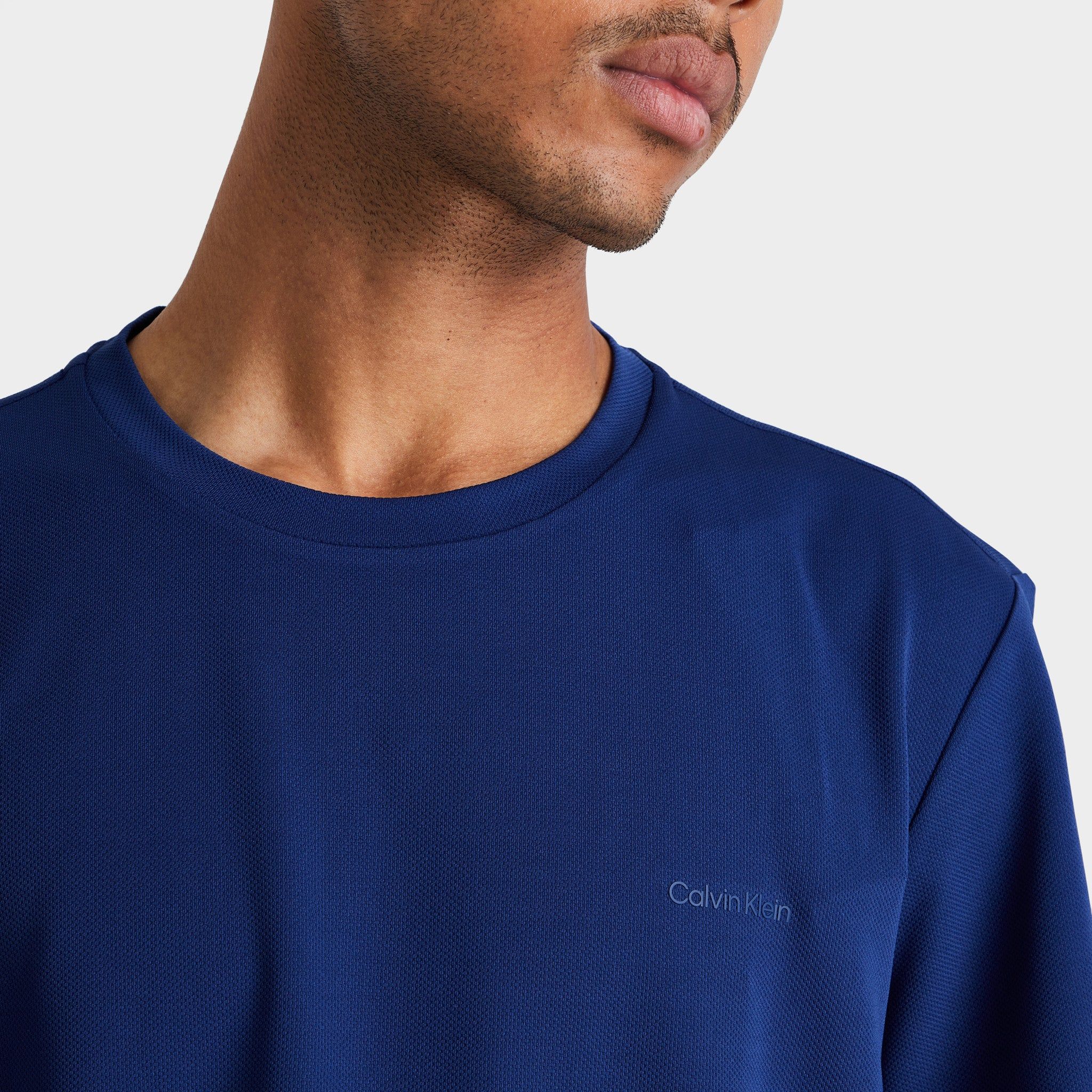 Calvin Klein Move 365 Solid Crewneck T-shirt / Blue Print sold by JD Sports product image thumbnail 4