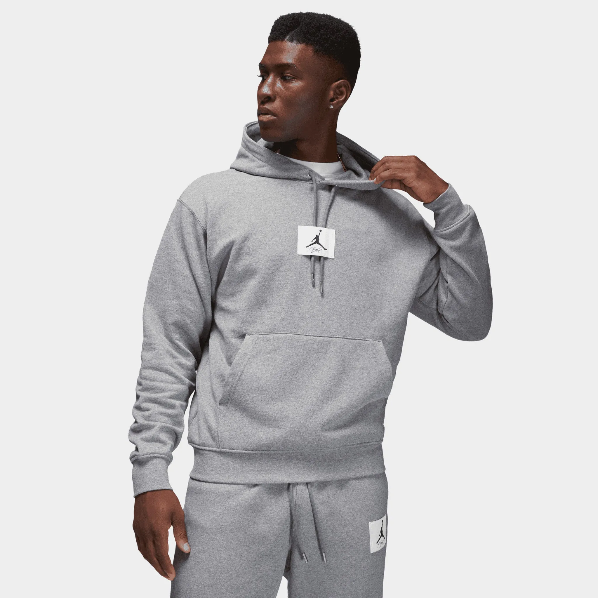 Jordan Flight Fleece Pullover Hoodie Carbon Heather / Sail sold by JD Sports