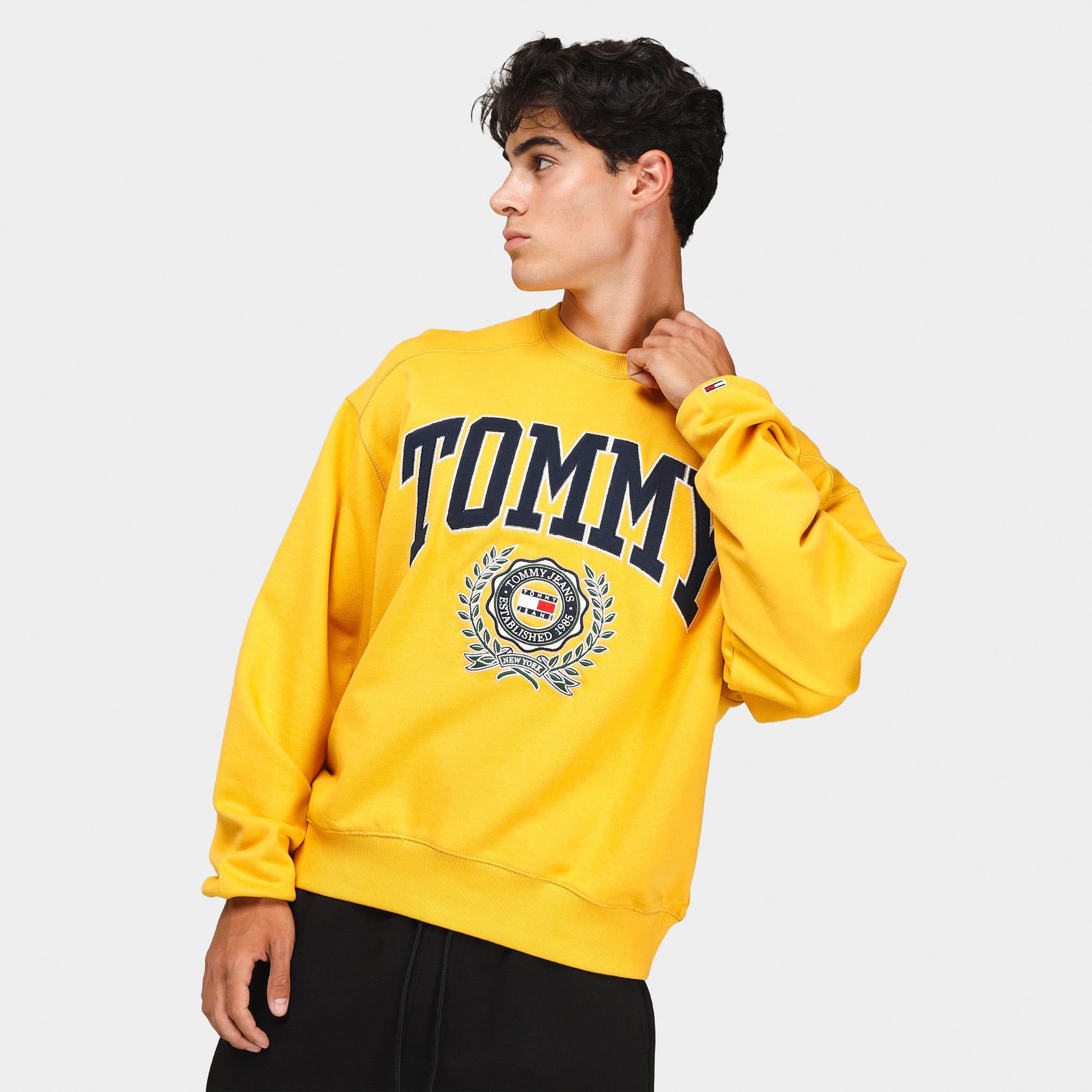 Tommy Jeans Collegiate Logo Crewneck / Collegiate Gold sold by JD Sports