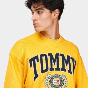 Tommy Jeans Collegiate Logo Crewneck / Collegiate Gold sold by JD Sports