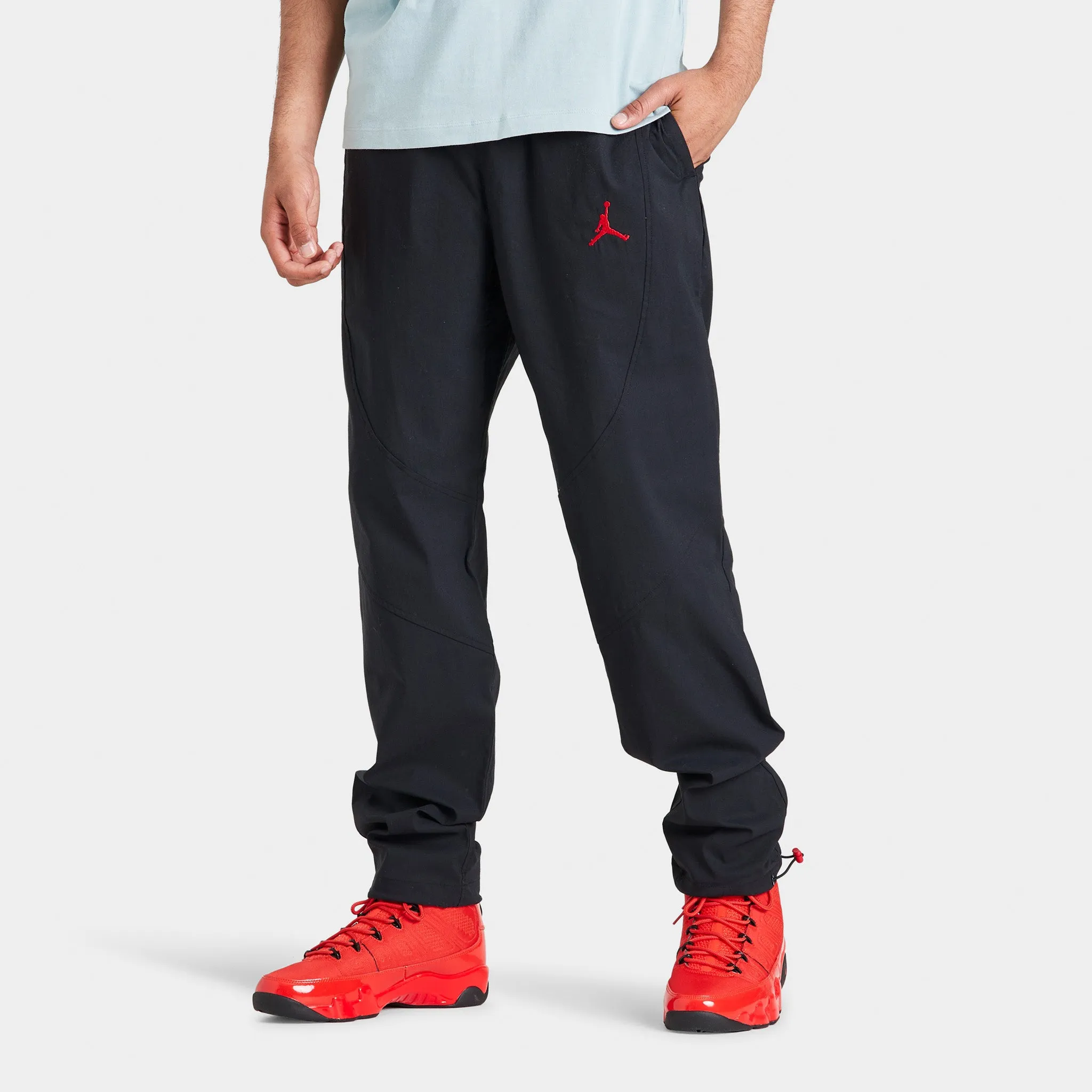 Jordan Essential Woven Pants Black / Gym Red sold by JD Sports