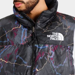 The North Face 1996 Retro Nuptse Vest / TNF Black Trail Glow Print sold by JD Sports