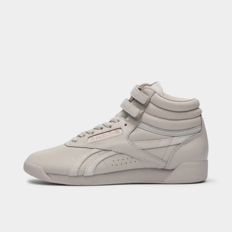 Reebok x Cardi B Women’s Freestyle Hi Moonstone / Boulder Flare - Cloud White sold by JD Sports