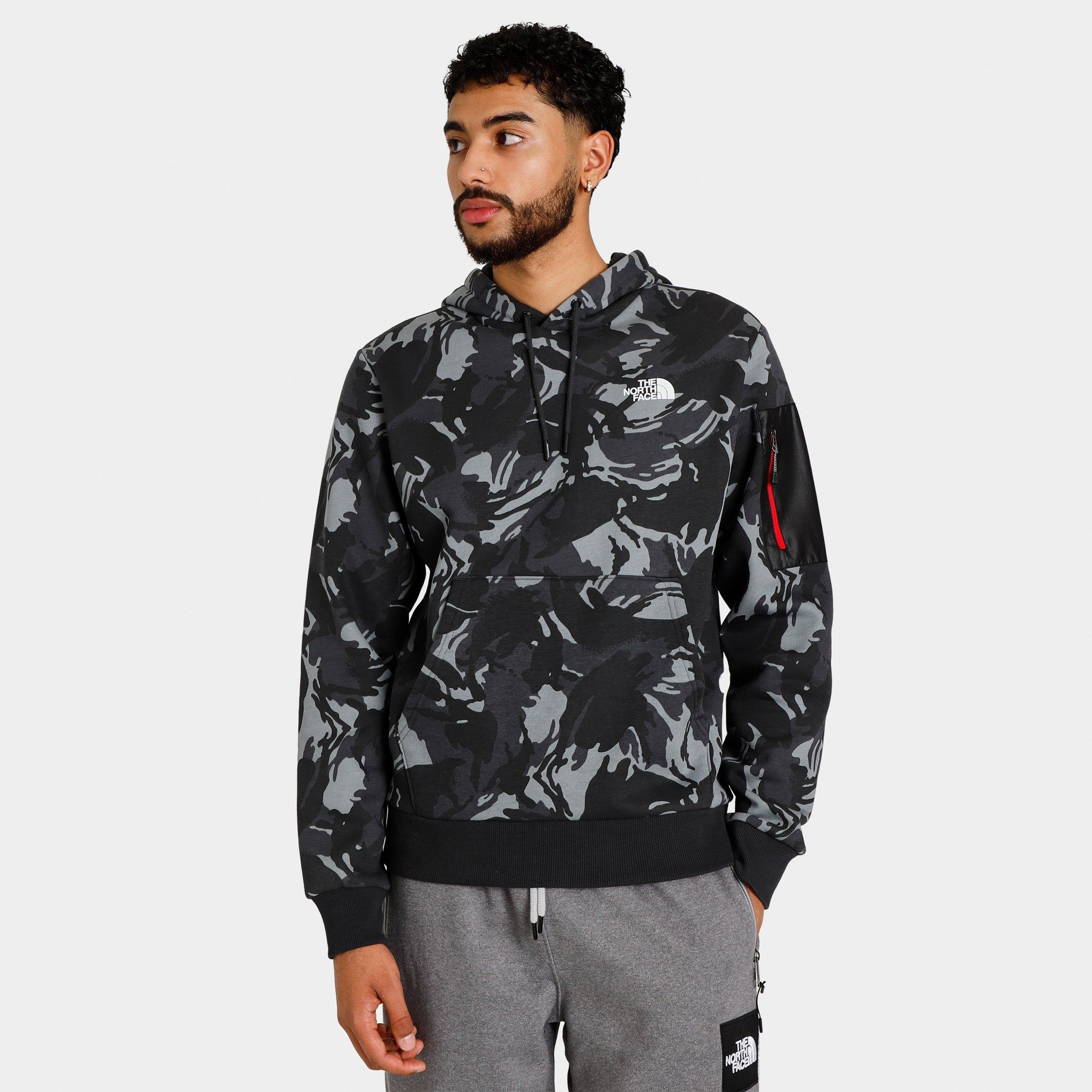 The North Face Woven Pocket Pullover Hoodie / Vanadis Grey Tonal Camo Print sold by JD Sports