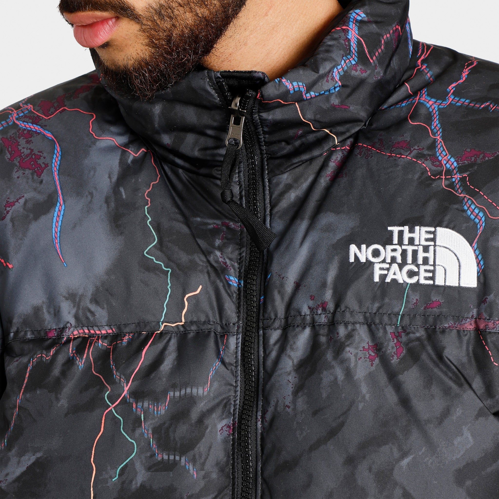 The North Face 1996 Retro Nuptse Jacket / TNF Black Trail Glow Print sold by JD Sports product image thumbnail 5