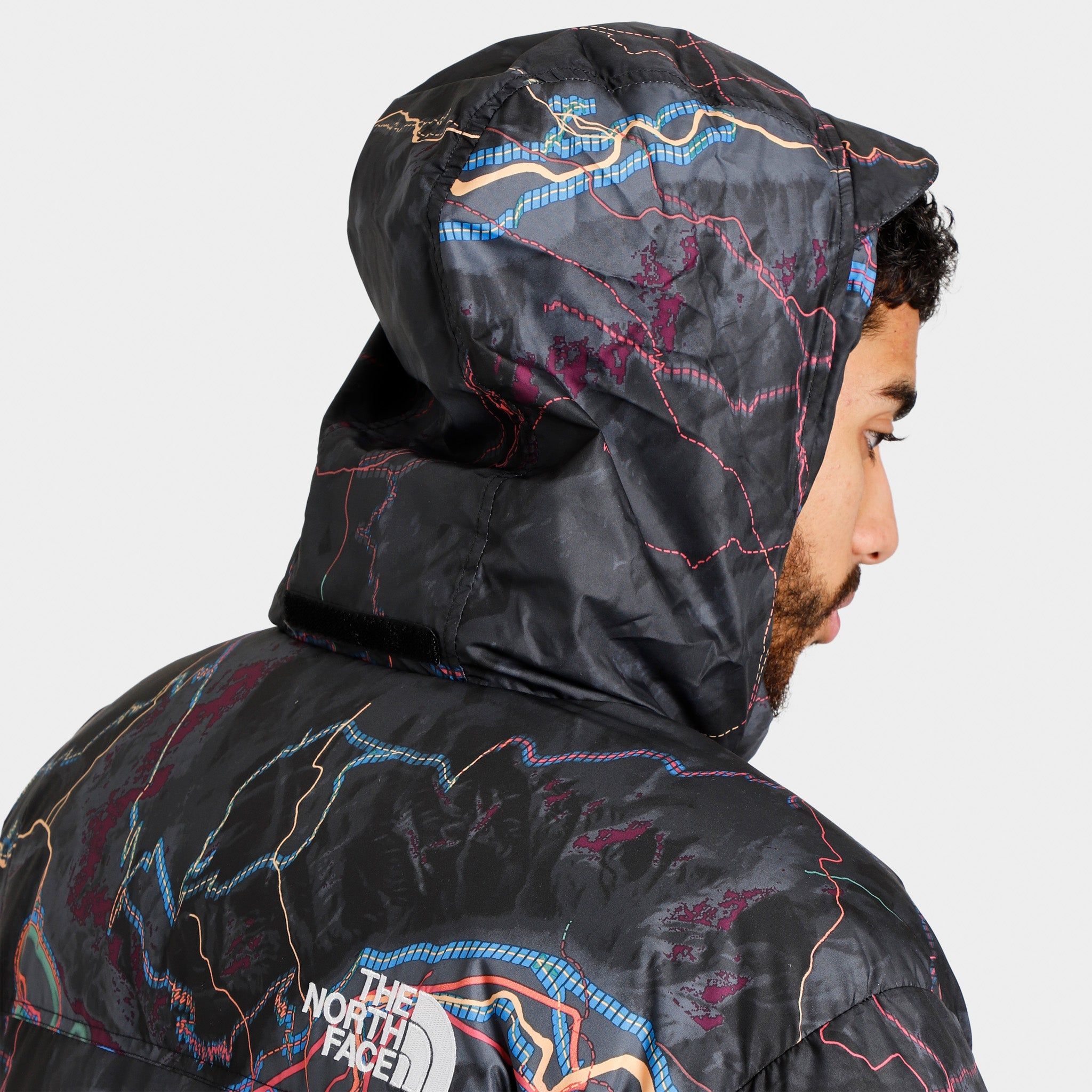 The North Face 1996 Retro Nuptse Jacket / TNF Black Trail Glow Print sold by JD Sports product image thumbnail 4