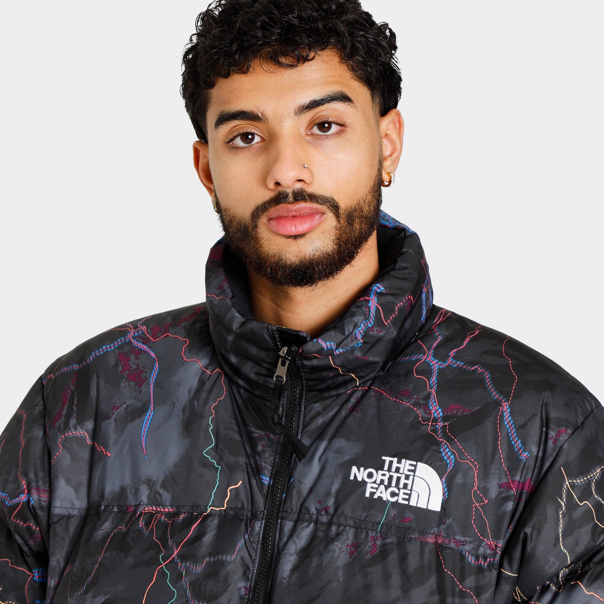 The North Face 1996 Retro Nuptse Jacket / TNF Black Trail Glow Print sold by JD Sports product image thumbnail 3