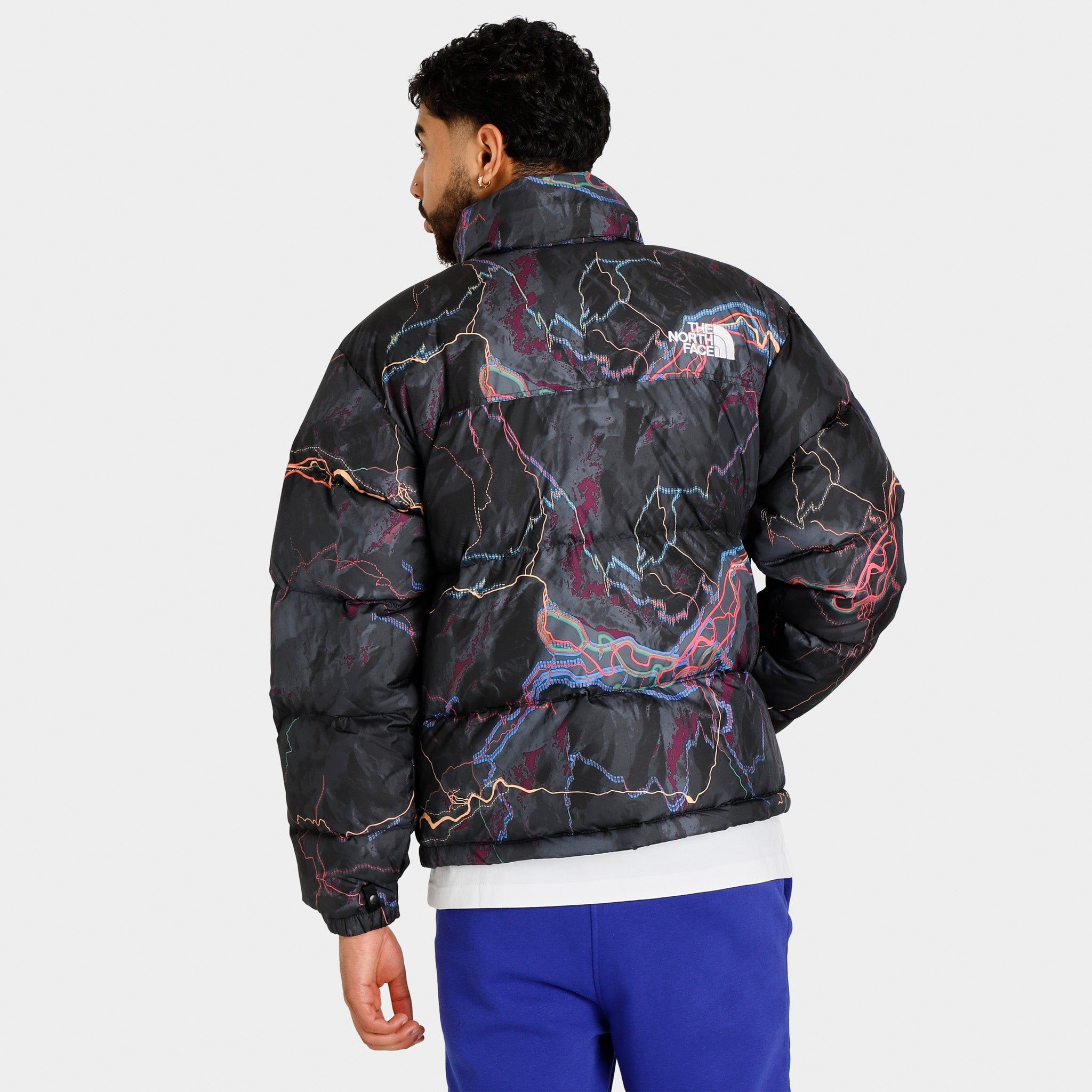 The North Face 1996 Retro Nuptse Jacket / TNF Black Trail Glow Print sold by JD Sports product image thumbnail 2