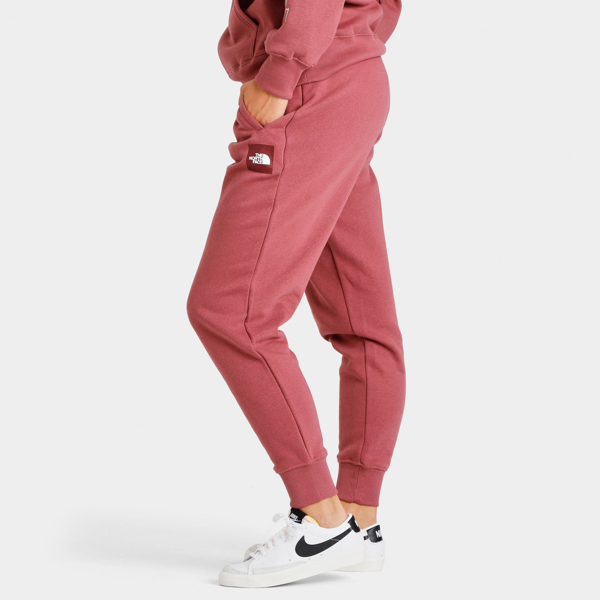 The North Face Women's Box NSE Joggers Wild Ginger / TNF White sold by JD Sports product image thumbnail 2