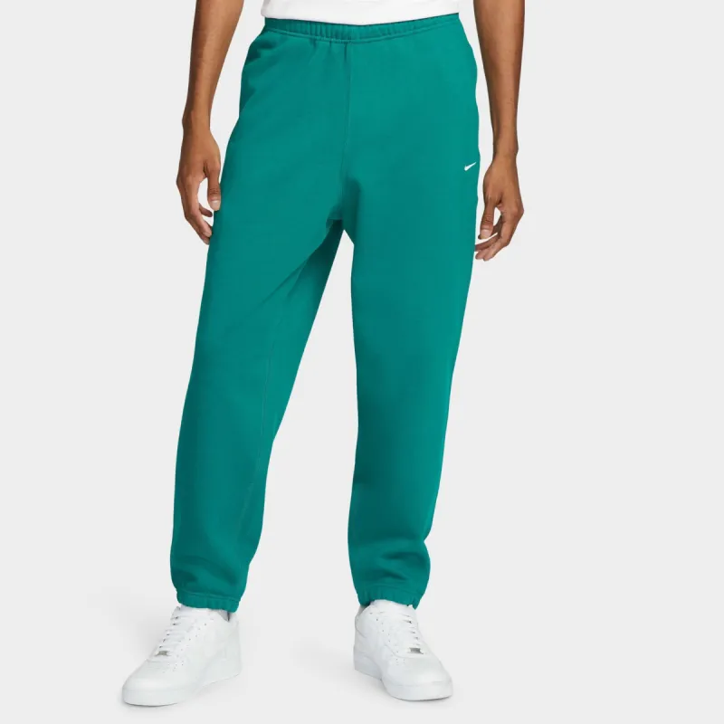 Nike Solo Swoosh Fleece Pants Mystic Green / White sold by JD Sports