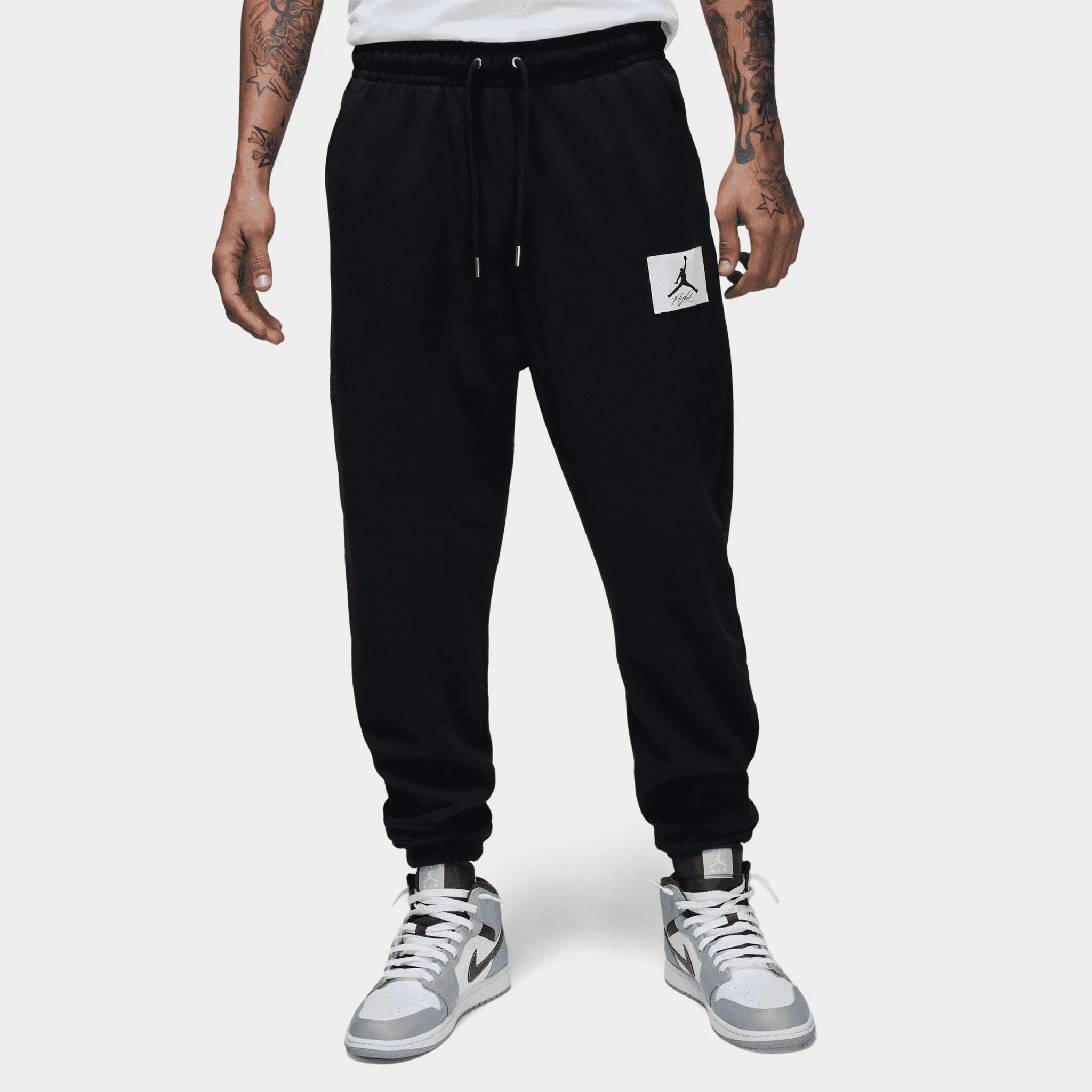 Jordan Essentials Fleece Pants Black / Sail sold by JD Sports