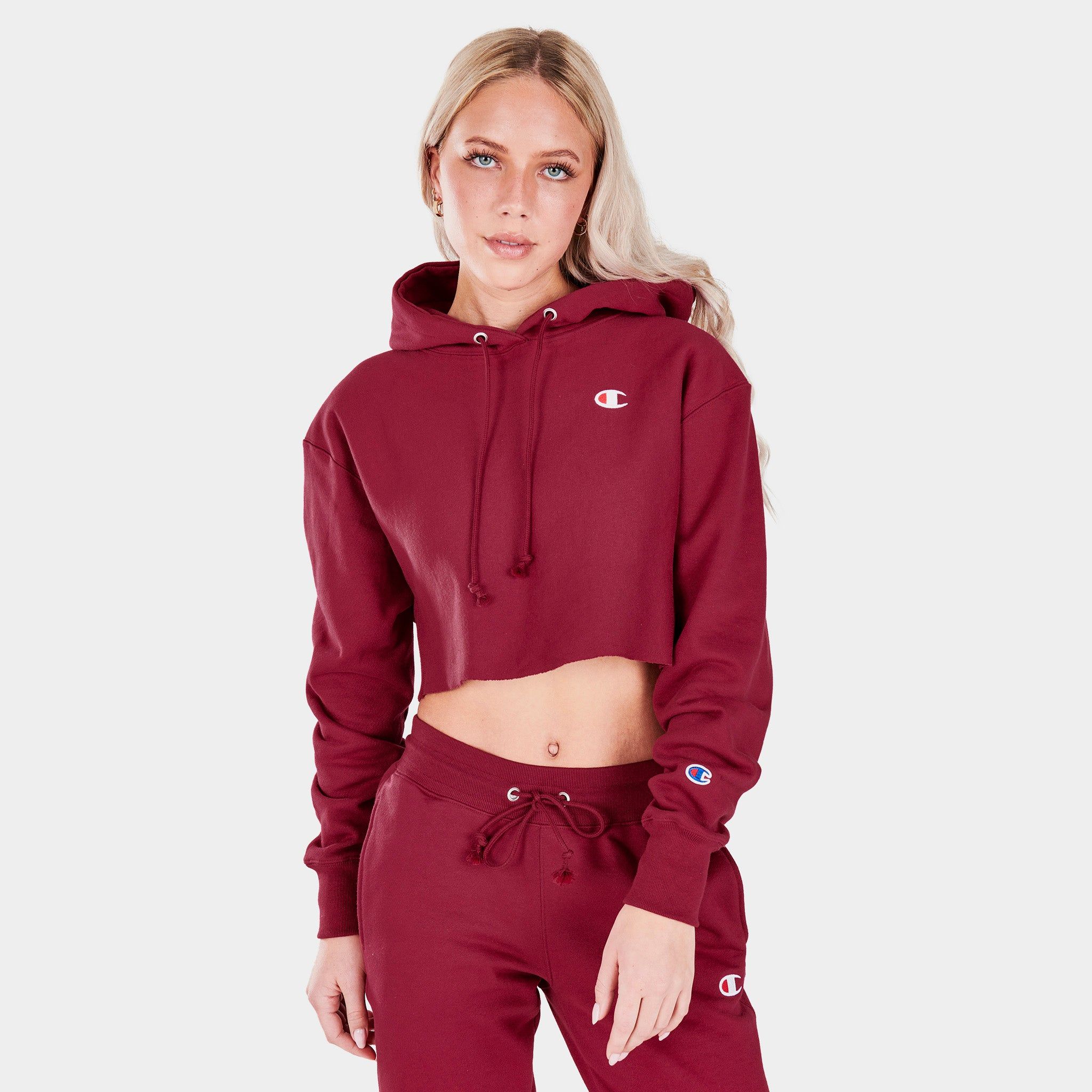 Champion Women’s Reverse Weave Cropped Pullover Hoodie / Cranberry Tart sold by JD Sports