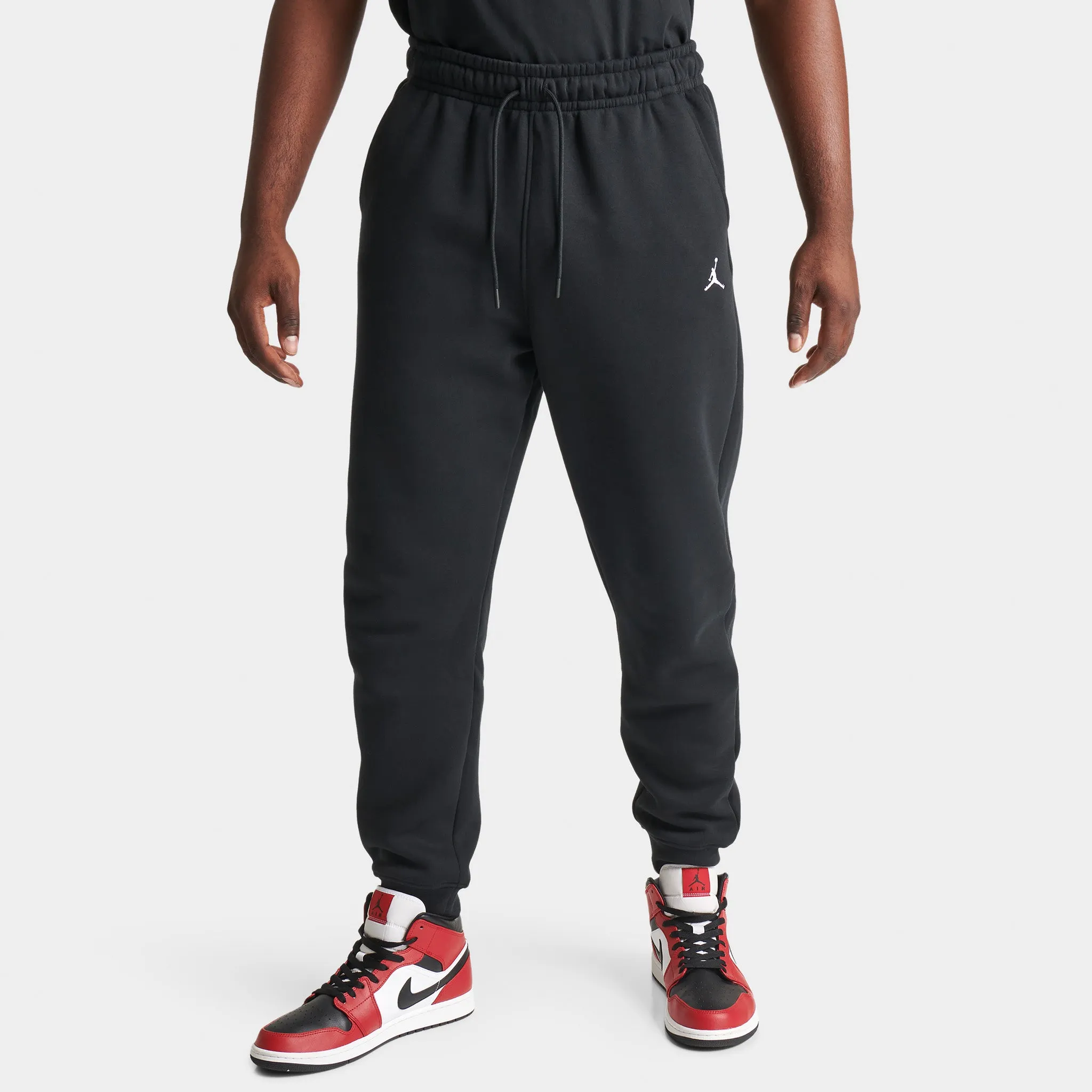 Jordan Essentials Fleece Pants Black / White sold by JD Sports