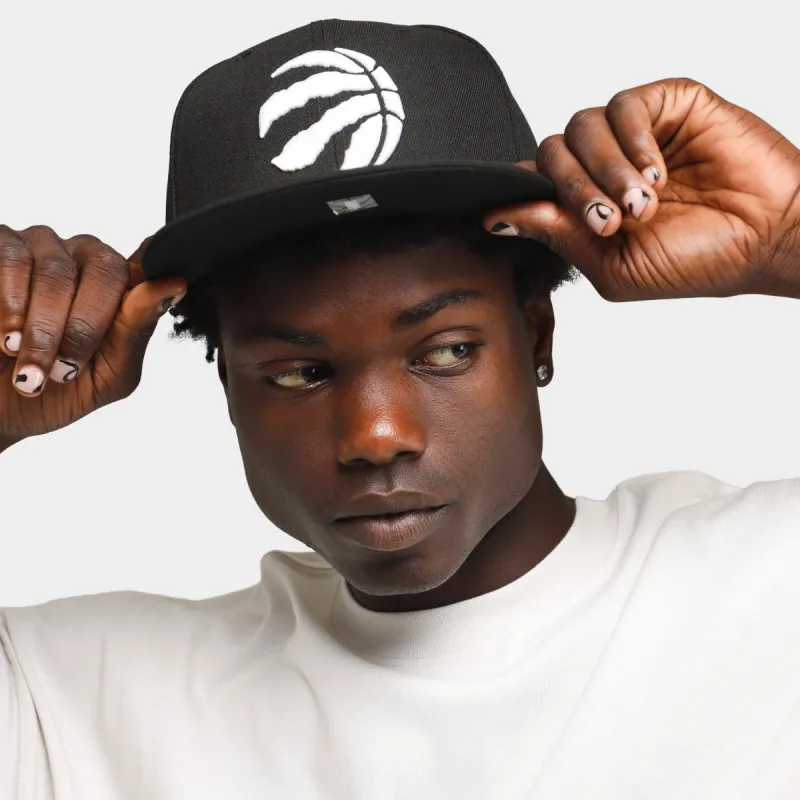 New Era Toronto Raptors 59Fifty Cap Black / White sold by JD Sports