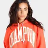 Champion Women’s Yarn-Dyed Reverse Weave Cropped Pullover Hoodie / Poppy Orange sold by JD Sports