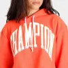 Champion Women’s Yarn-Dyed Reverse Weave Cropped Pullover Hoodie / Poppy Orange sold by JD Sports
