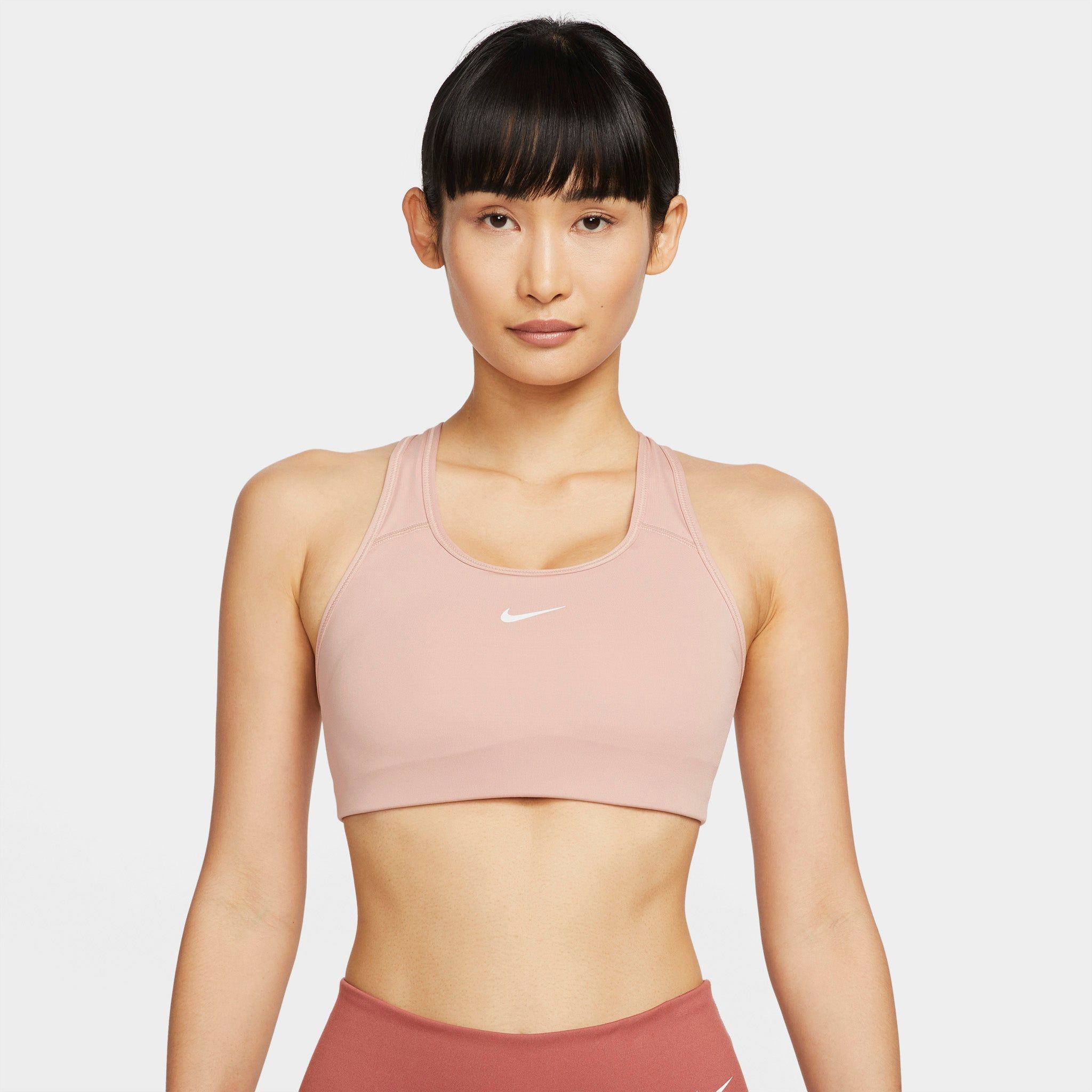 Nike Women's Dri-FIT Swoosh Medium-Support 1-Piece Pad Sports Bra Rose Whisper / White sold by JD Sports