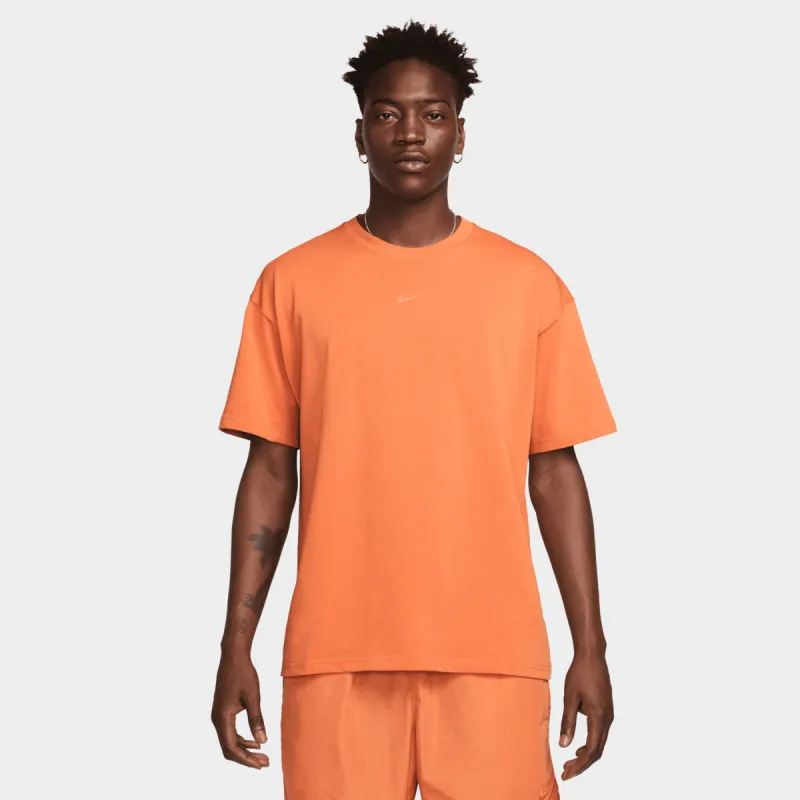 Nike NOCTA NRG Short Sleeve T-shirt Hot Curry / Orange Trance sold by JD Sports