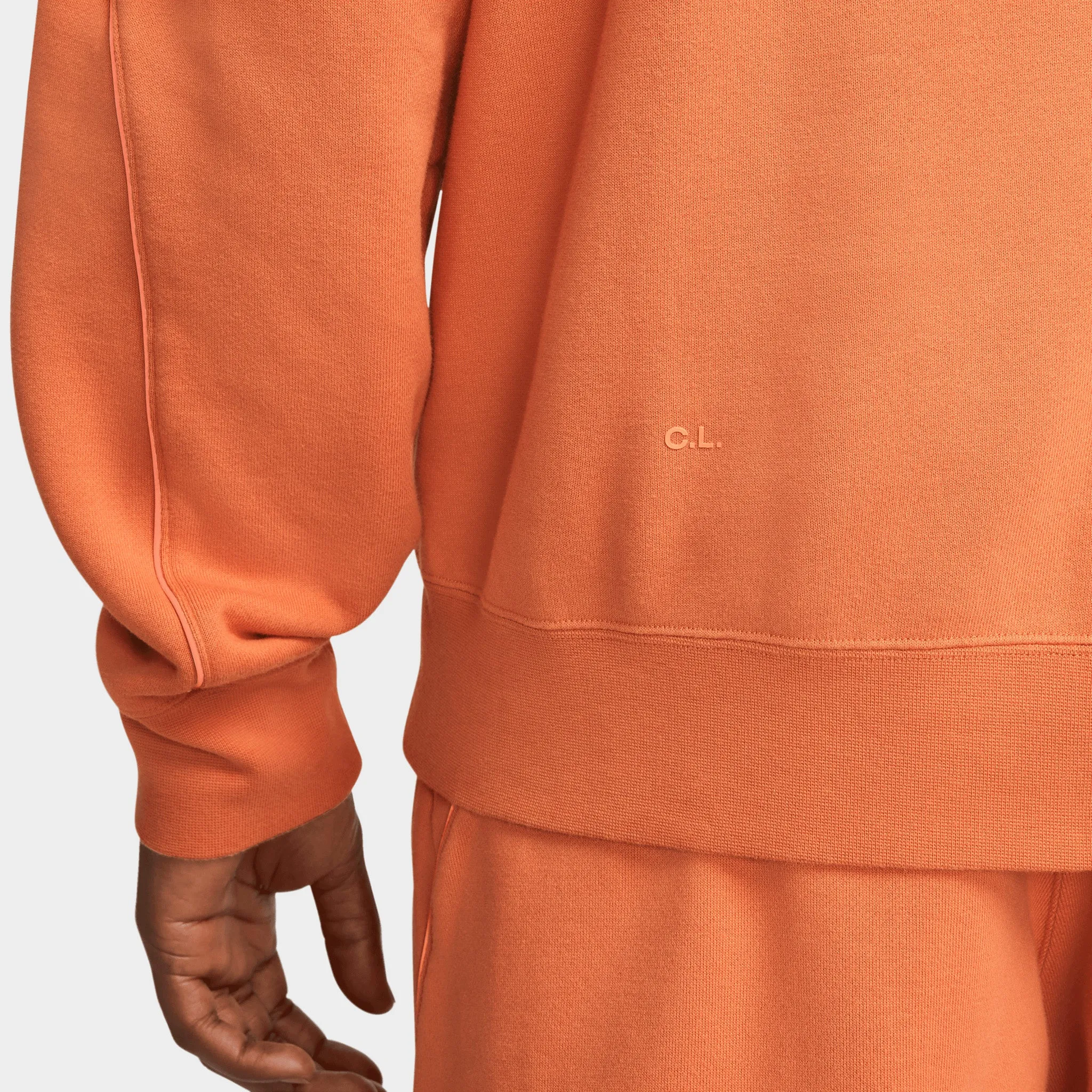 Nike NOCTA NRG Fleece Pullover Hoodie Hot Curry / Orange Trace sold by JD Sports product image thumbnail 5