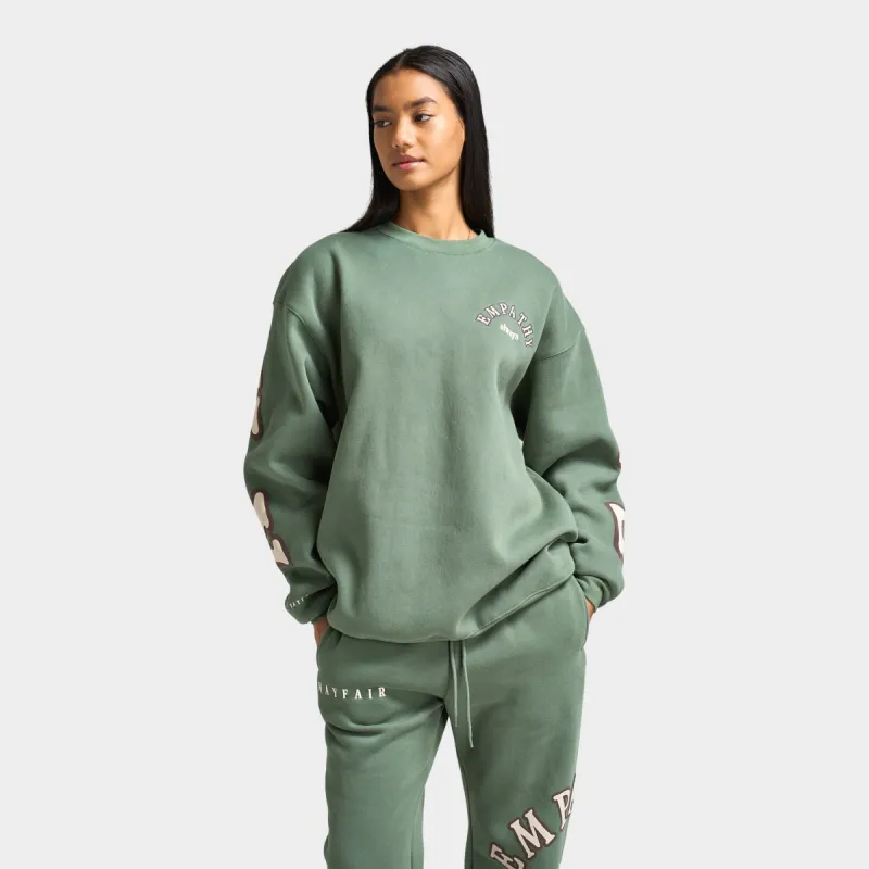 Mayfair Women's Empathy Always Crewneck / Olive sold by JD Sports