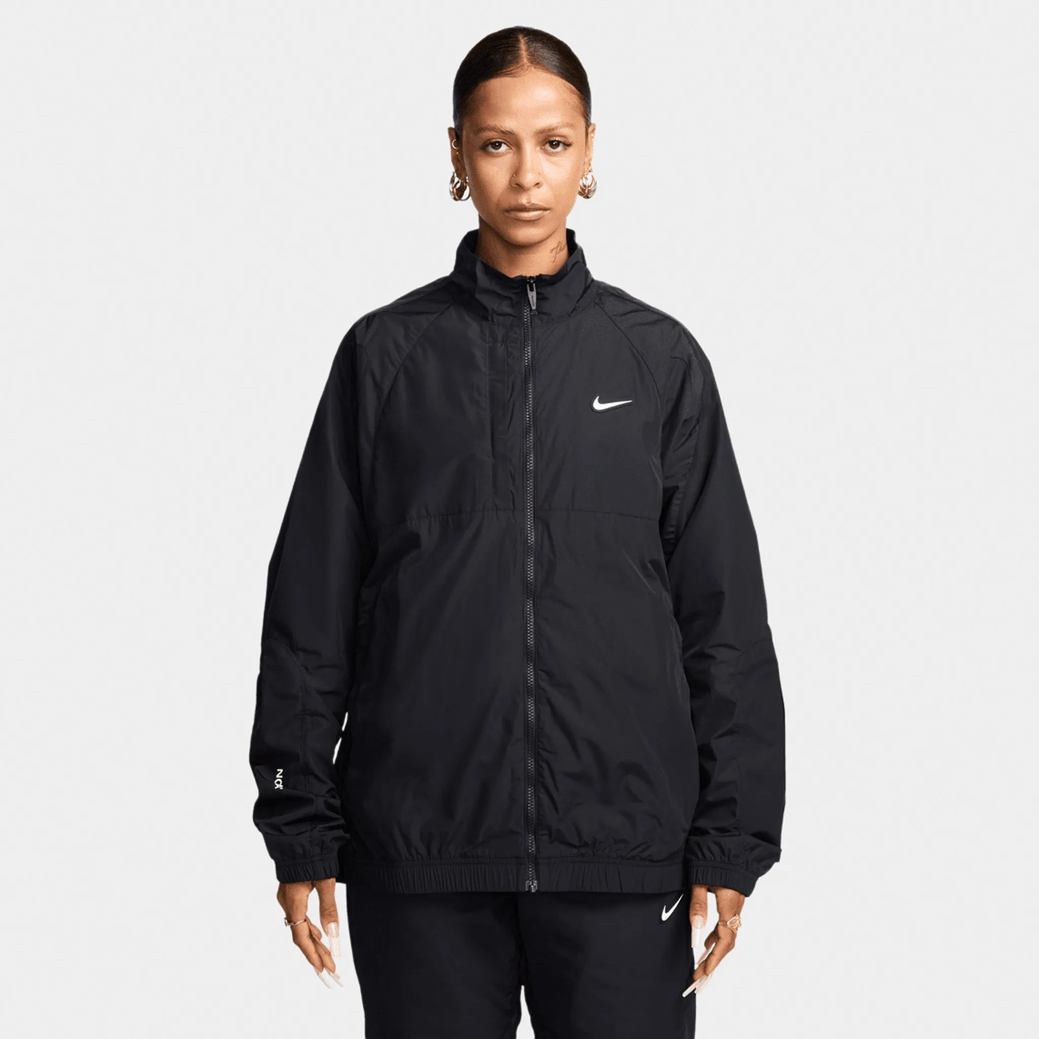 Nike Nocta NRG Woven Track Jacket Black / White sold by JD Sports