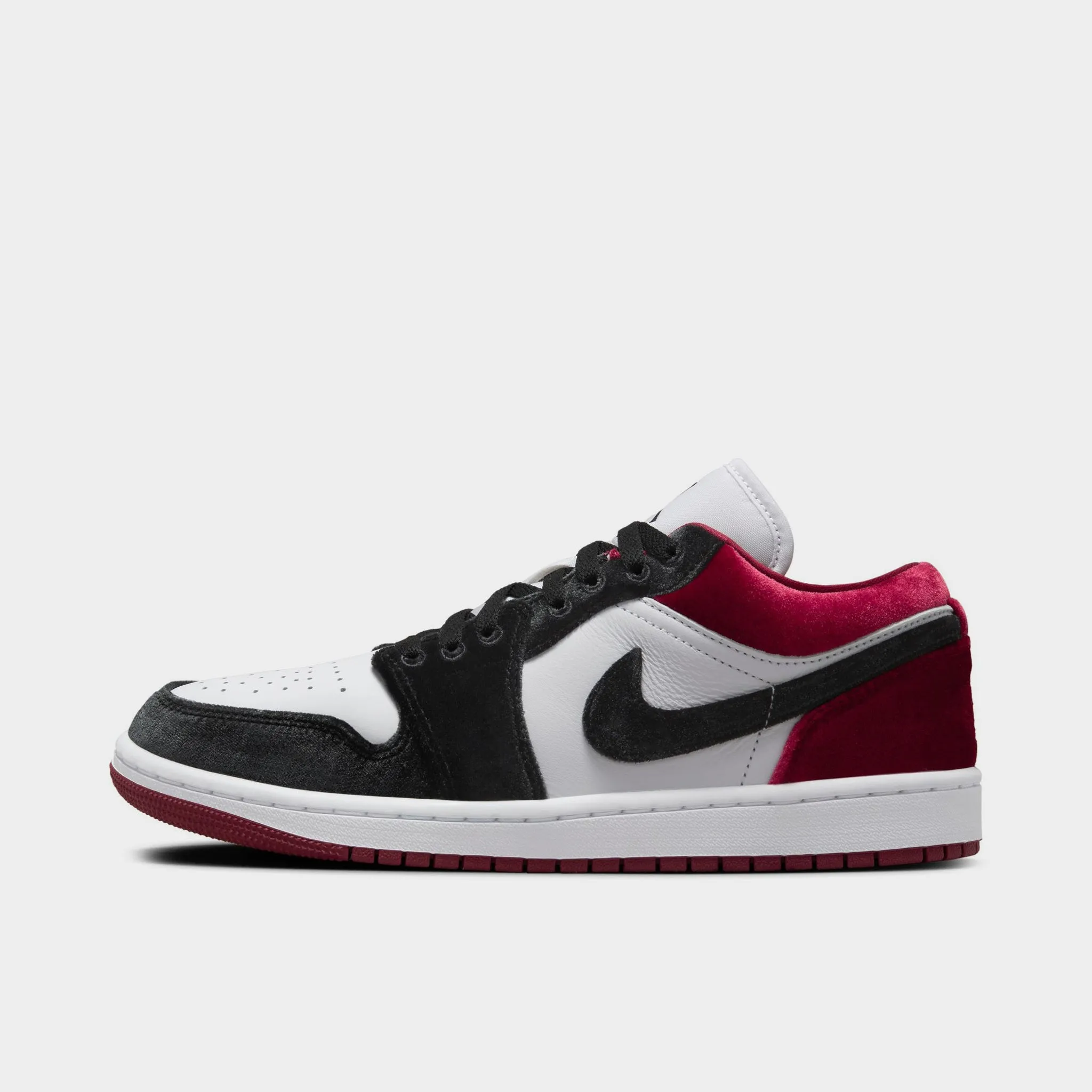 Jordan Women's 1 Low SE Black / White - Team Red sold by JD Sports