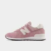 New Balance 574 / Pink sold by JD Sports