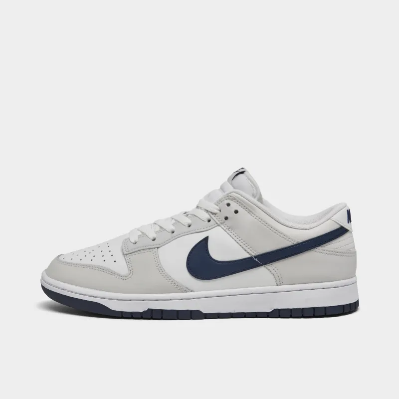 Nike Dunk Low Retro Summit White / Midnight Navy sold by JD Sports