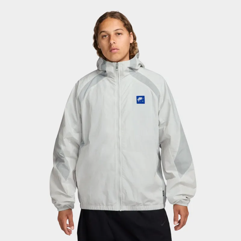 Nike Air Woven Jacket Photon Dust / Lt Smoke Grey - Black sold by JD Sports