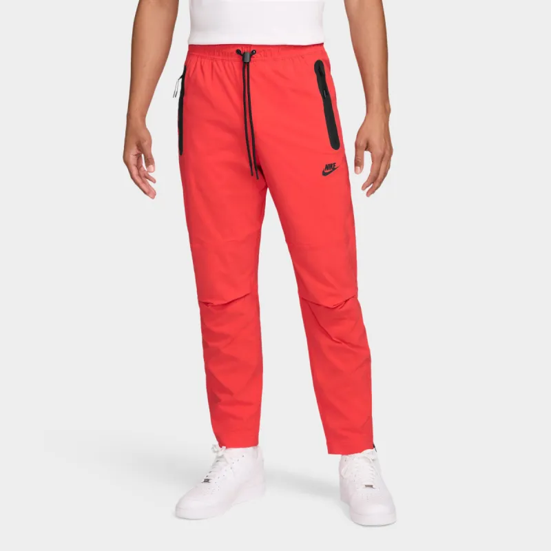 Nike Tech Woven Trousers Lt Crimson / Black sold by JD Sports