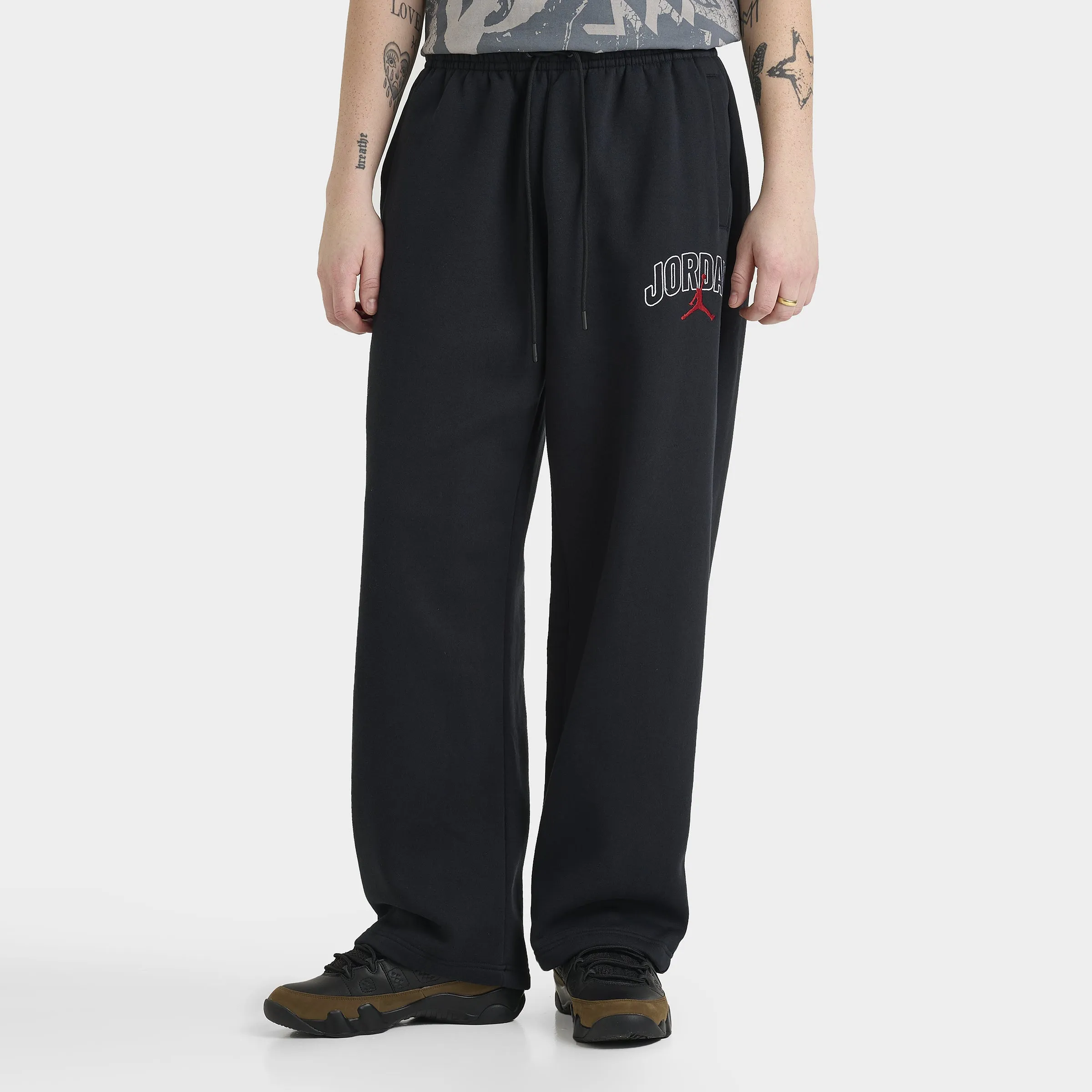 Jordan Brooklyn Oversized Graphic Pants Black / Gym Red sold by JD Sports