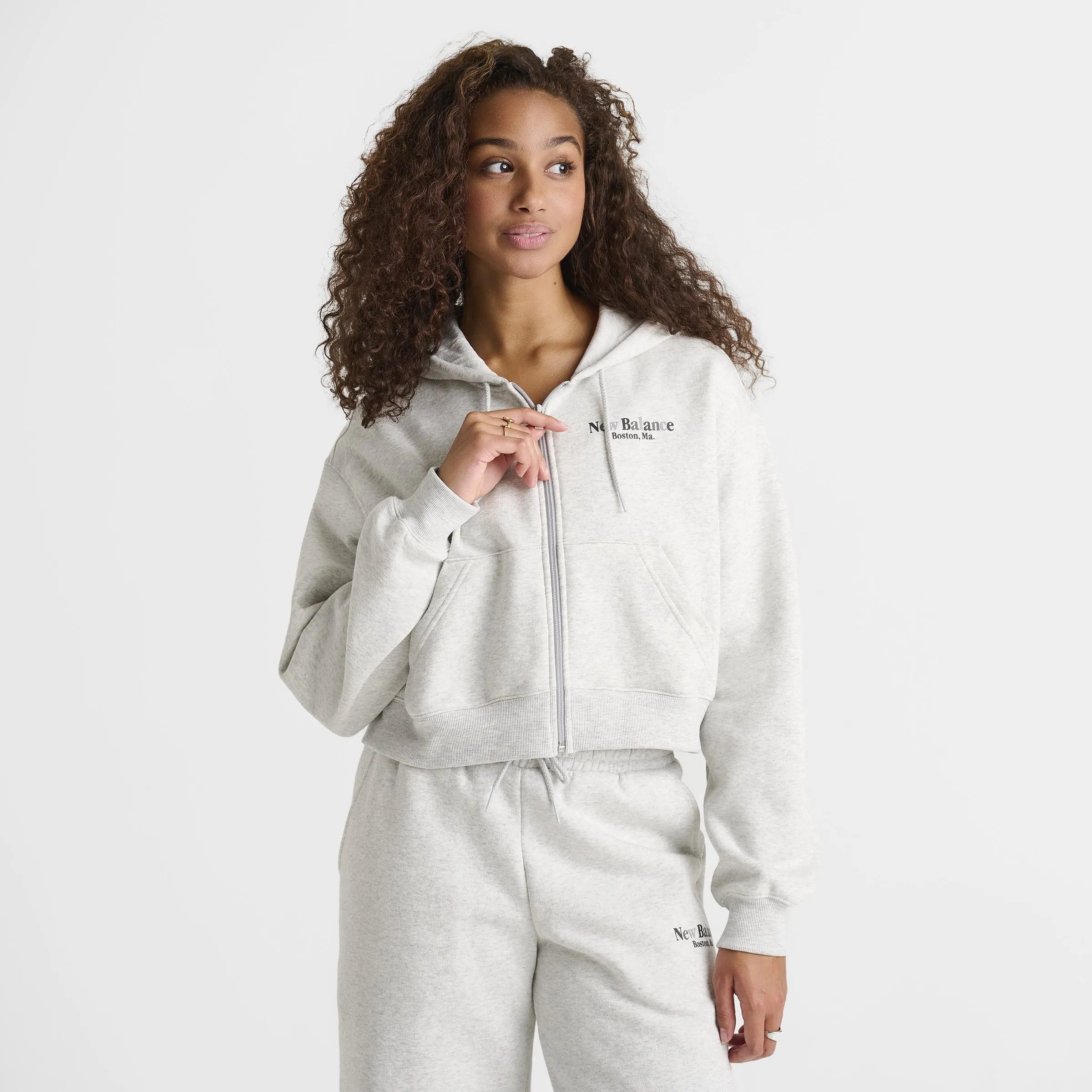 New Balance Women's Linear Crop Full Zip Hoodie Black sold by JD Sports