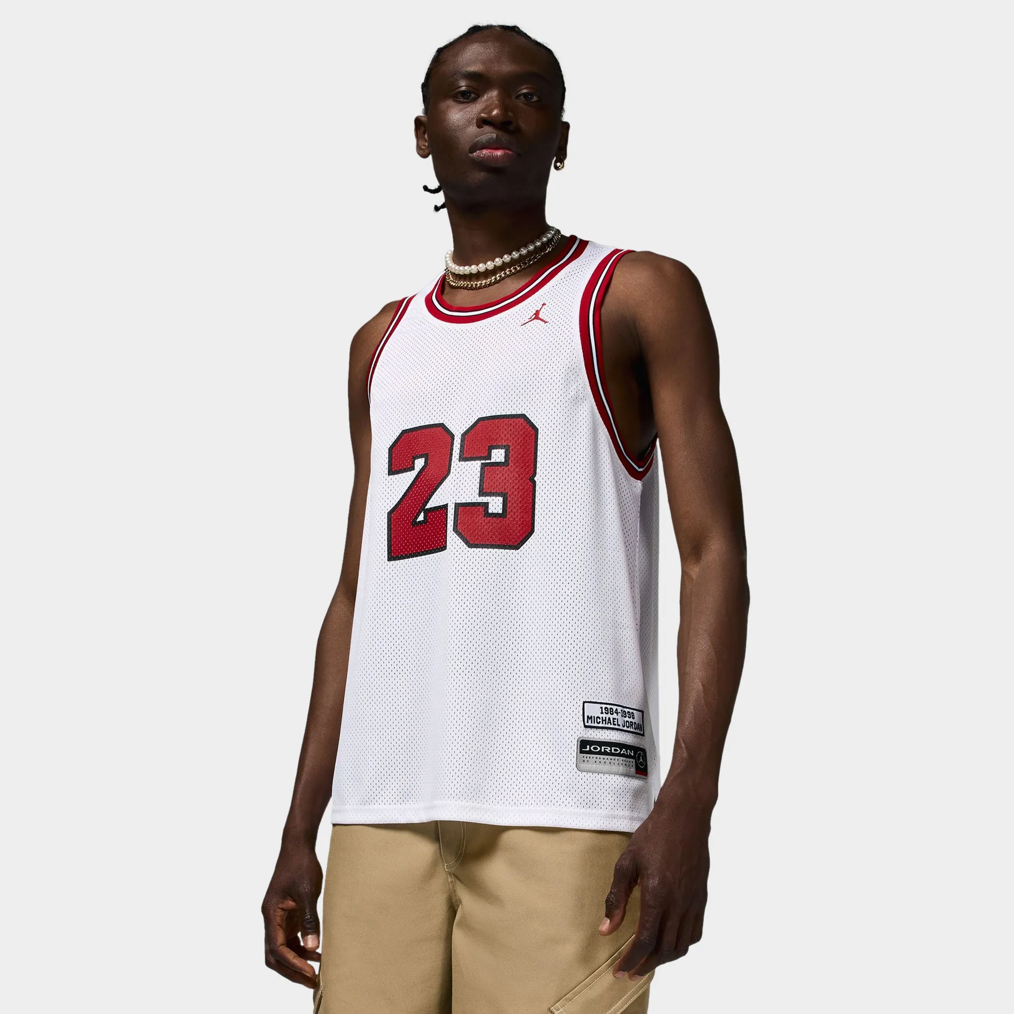 Jordan Essentials Summer Jersey White / Gym Red sold by JD Sports