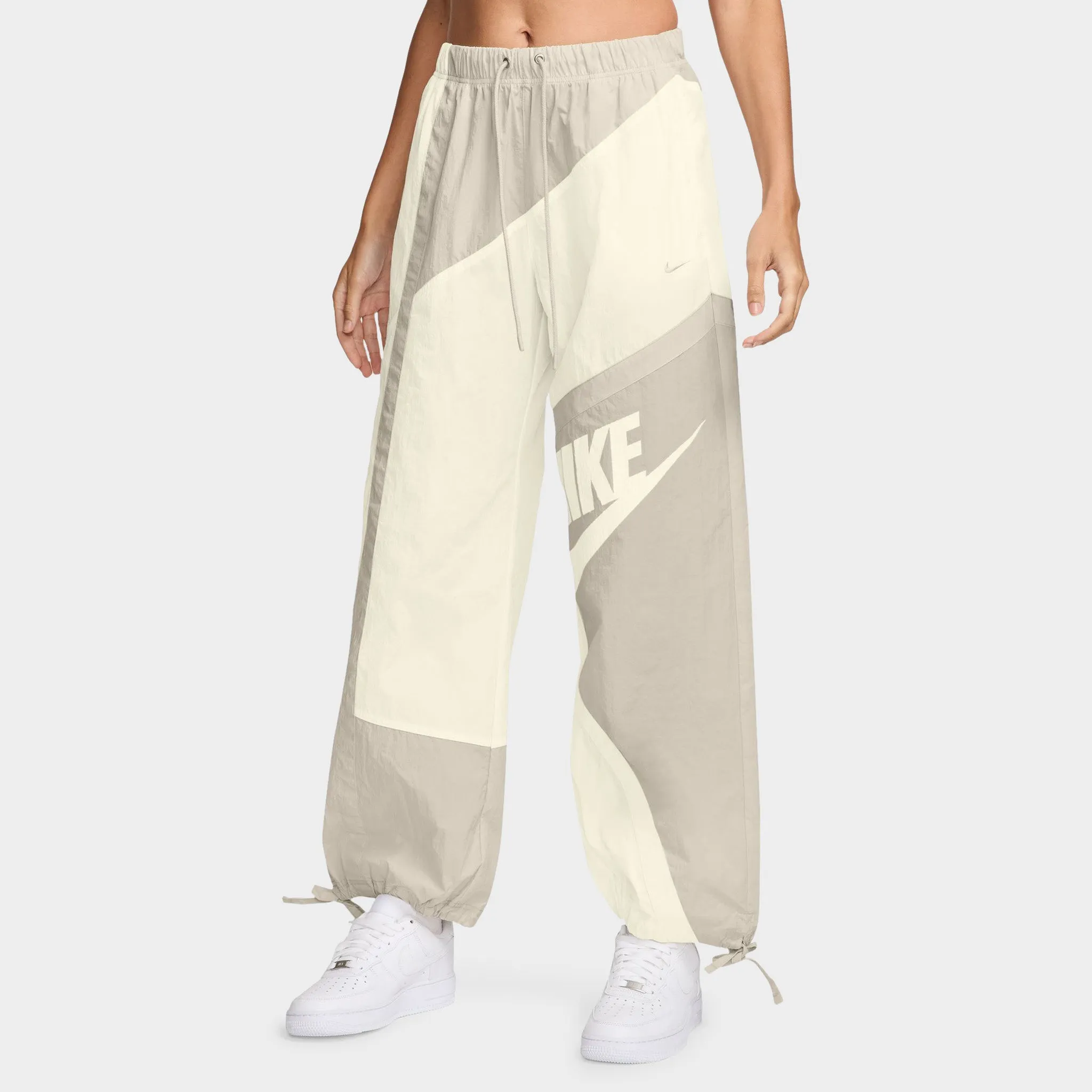Nike Sportswear Women's Mid-Rise Loose Woven Open-Hem Pants Sail / Lt Orewood Brown sold by JD Sports