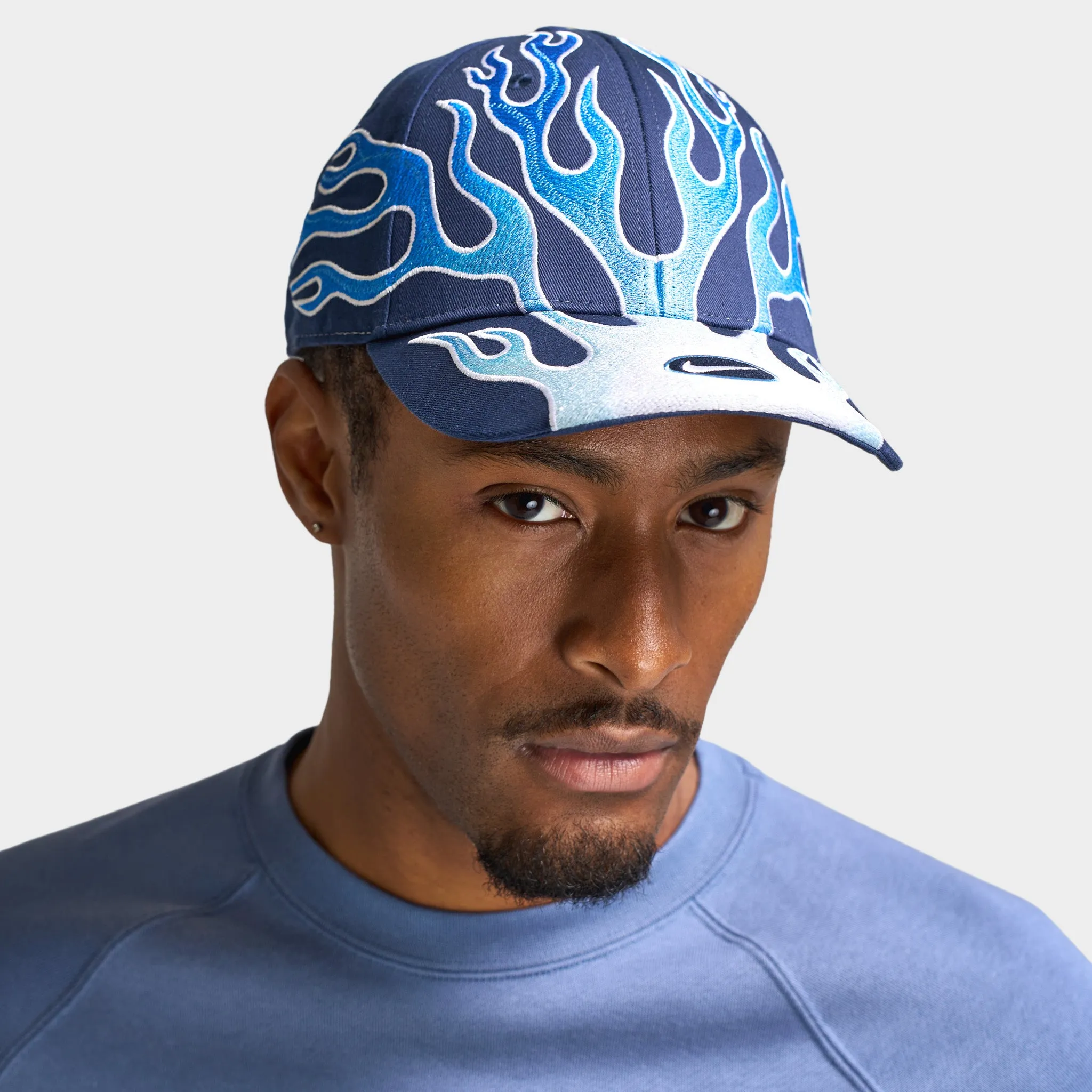 Nike Flame Club Cap / Midnight Navy sold by JD Sports