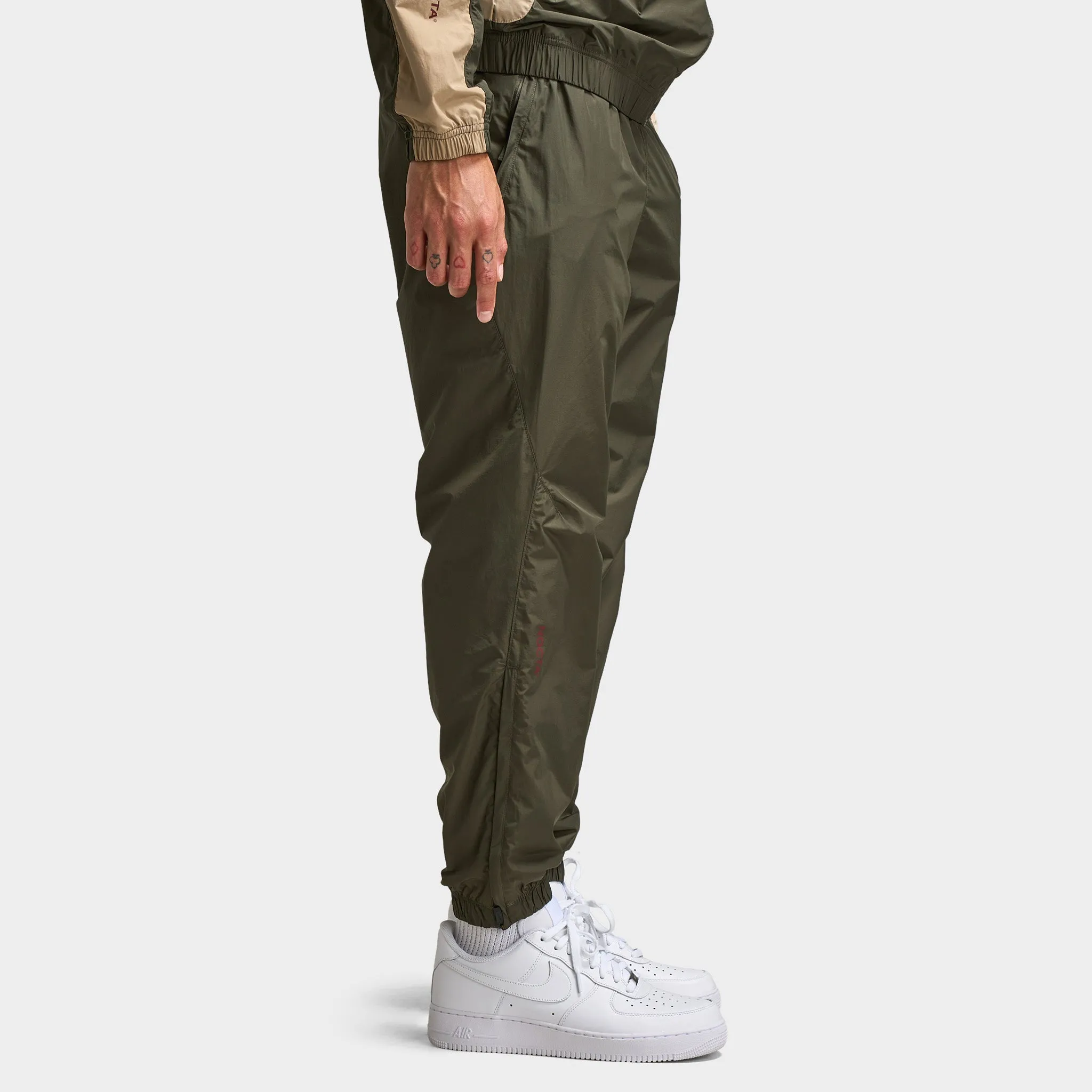 Nike NOCTA CS Cardinal Woven Track Pants Cargo Khaki / Smoke Grey sold by JD Sports product image thumbnail 3